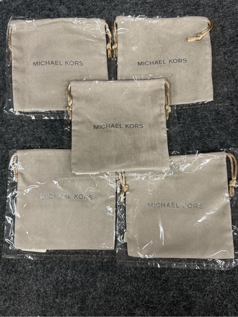 NEW Michael Kors Beige Drawstring Jewelry Pouches With Silver Logo - Set of 5